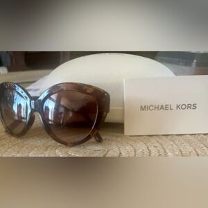 Micheal Kors Sun glasses brown color never worn